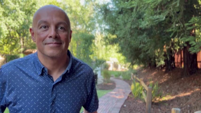 Ed Perez, standing in a garden, about to explain the gap between leadership and the frontline workforce